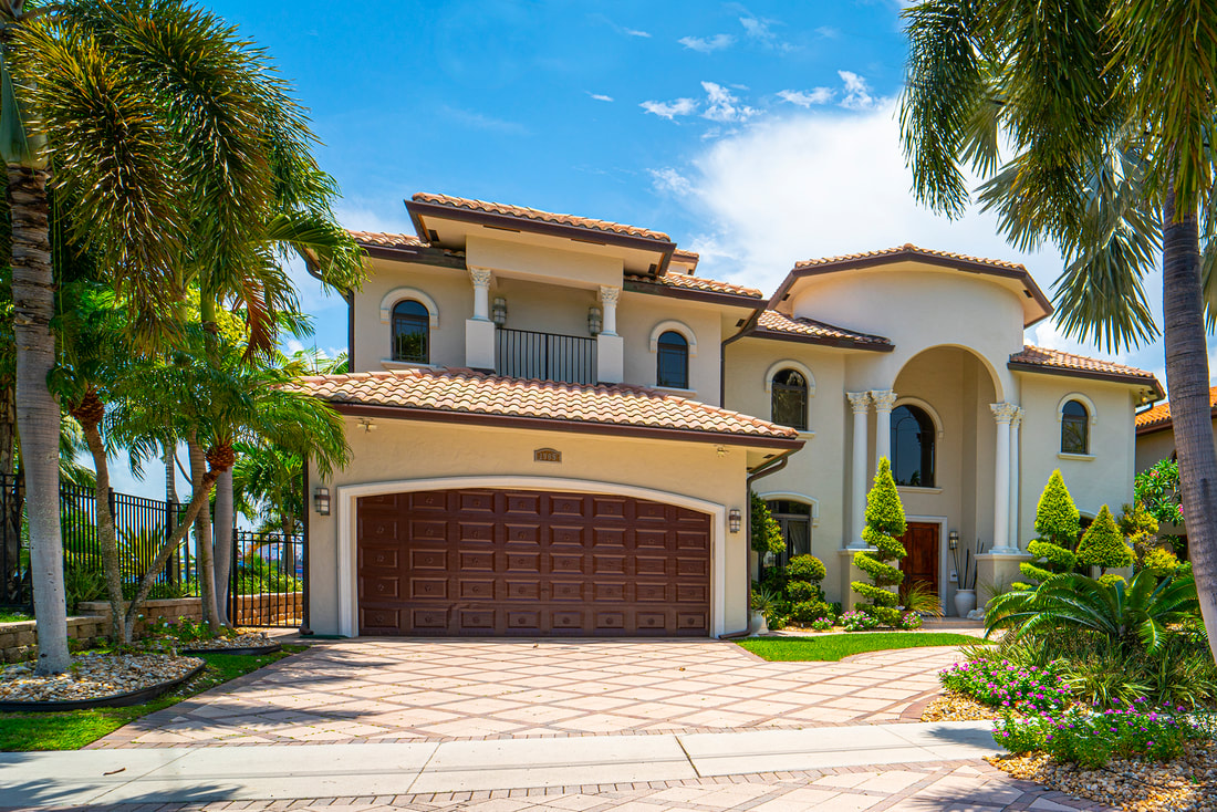 South Florida home with palm trees, for the Palm Beach Living Guide
