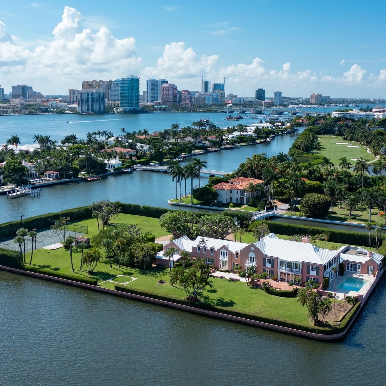 Luxury homes for sale in Palm Beach, Florida, waterfront estates along the Palm Beach County coast at sunset